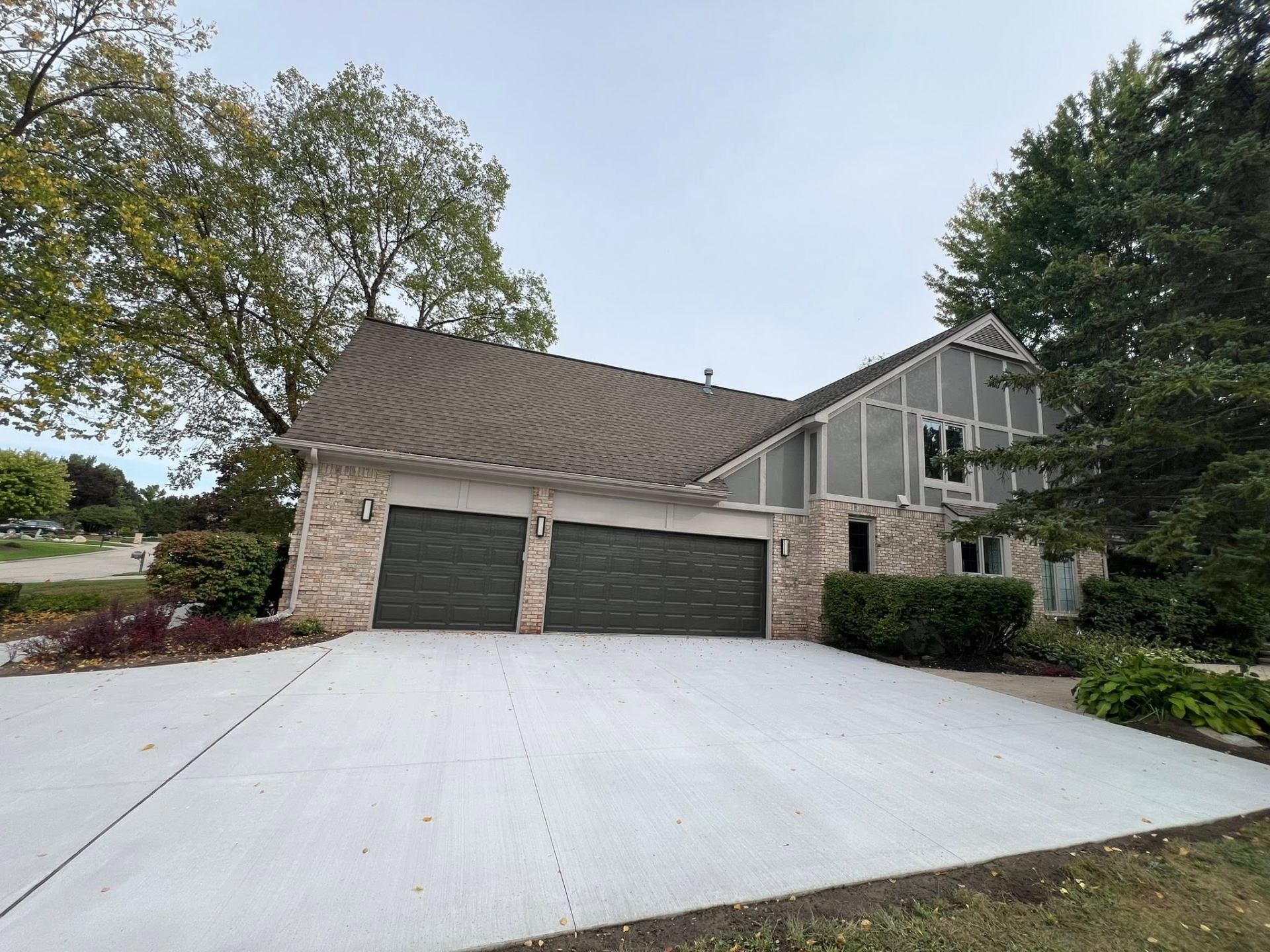 Completed concrete driveway replacement in Plymouth, Michigan